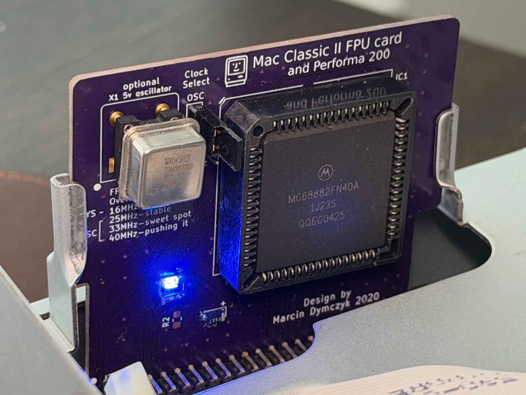 Mac Classic II FPU card installed in a classic Mac.